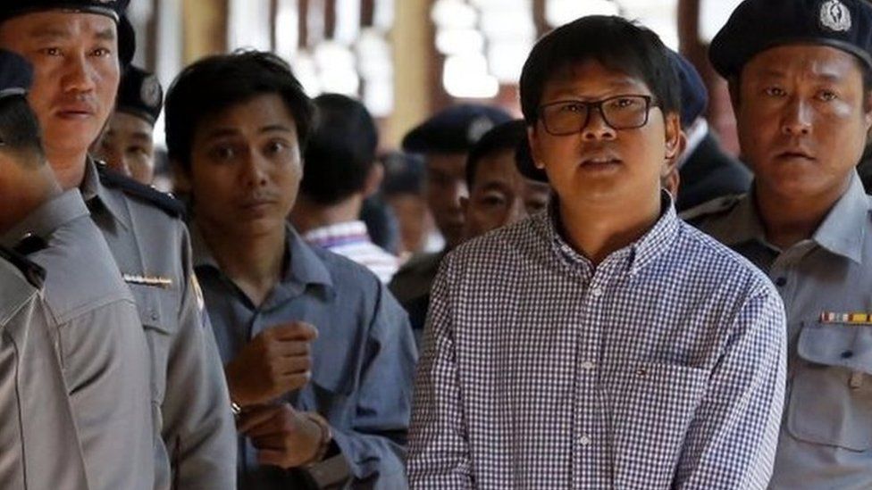 Detained Reuters journalist Wa Lone (2-R) and Kyaw Soe Oo (2-L) are escorted by police as they leave the court after the hearing in Yangon, Myanmar, 01 February 2018.