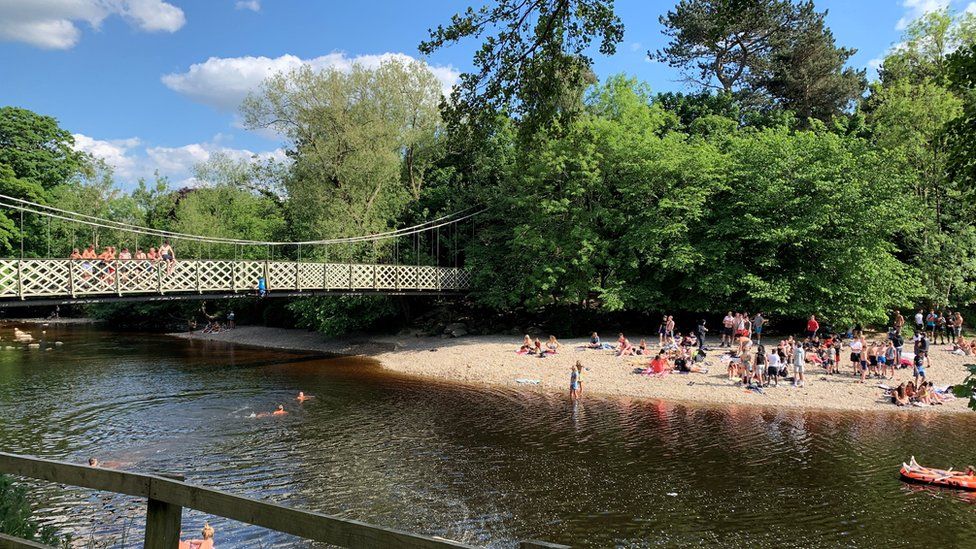 People in the River Wharfe