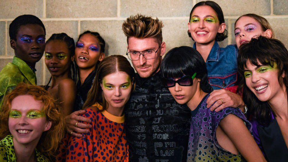Henry Holland with his models backstage at LFW