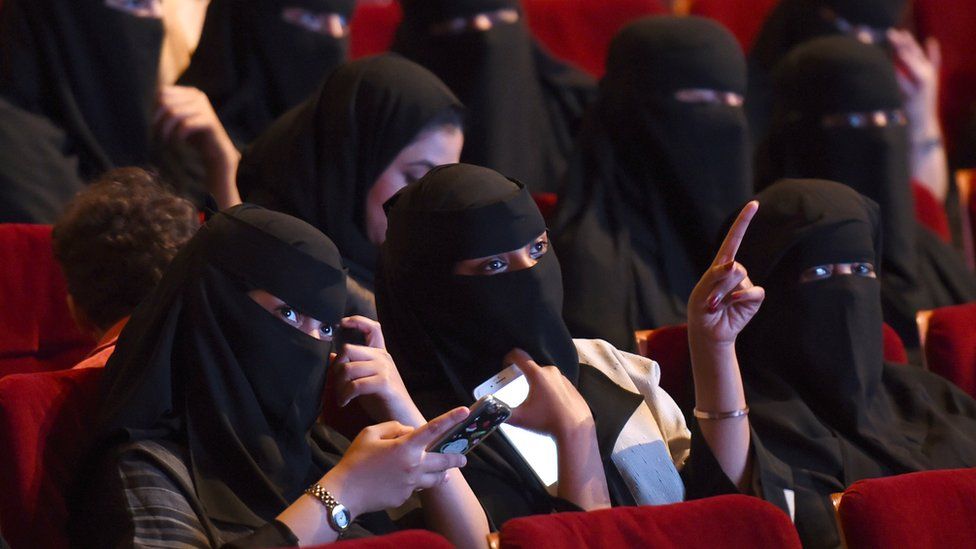 Saudi women attend a film festival at King Fahad Culture Center in Riyadh, 20 October 2017