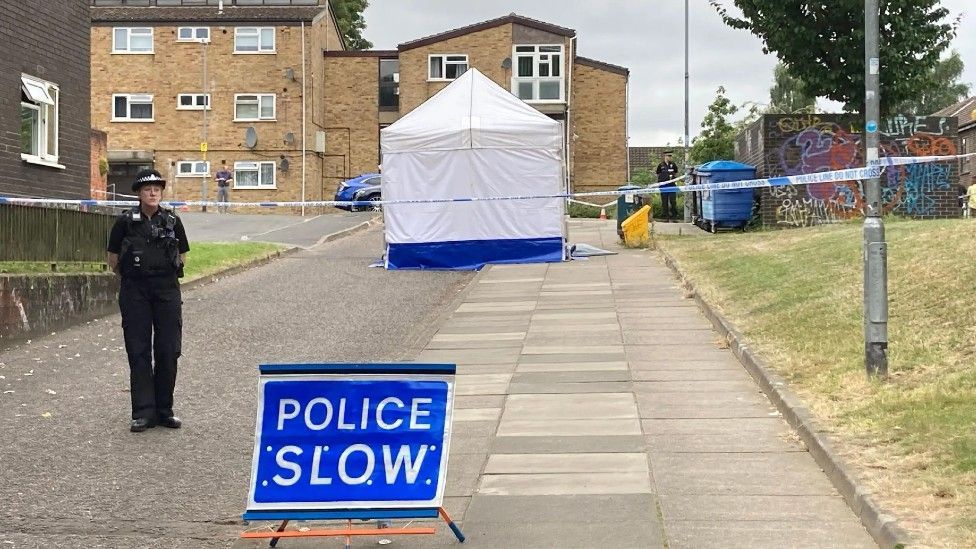 Police slow sign at Paragon Place in Norwich