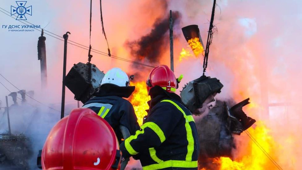 Firefighters tackle a blaze in Ukraine's central Cherkasy region after a Russian missile strike. Photo: 31 October 2022