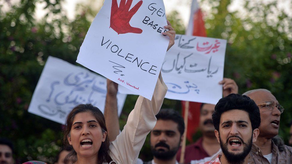 Pakistani civil society activists carry placards during a protest in Islamabad on July 18, 2016 against the murder of social media celebrity Qandeel Baloch by her own brother