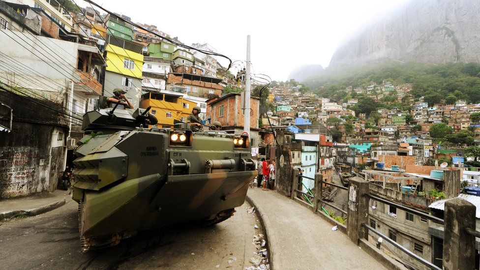 Brazilian marines entering Rio de Janeiro in 2011 to seize control of the city's largest favela