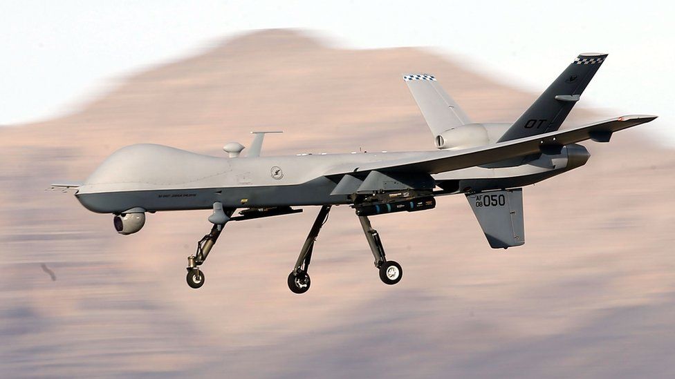 An MQ-9 Reaper remotely piloted aircraft (RPA) flies by during a training mission