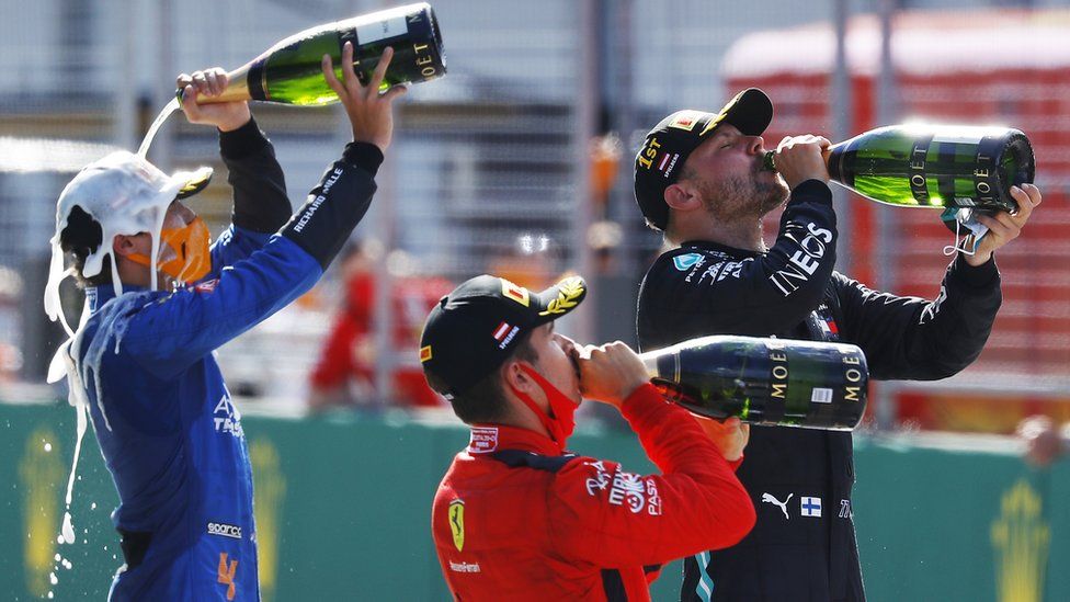 Lando Norris prefers the taste of milk to champagne. Seriously, he does.