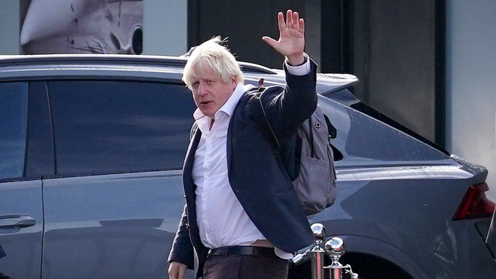 Boris Johnson arrives at Gatwick Airport in London, after travelling on a flight from the Caribbean