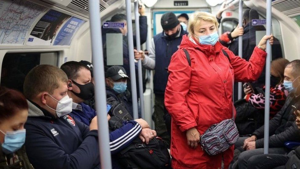 Passengers on a London Tube train