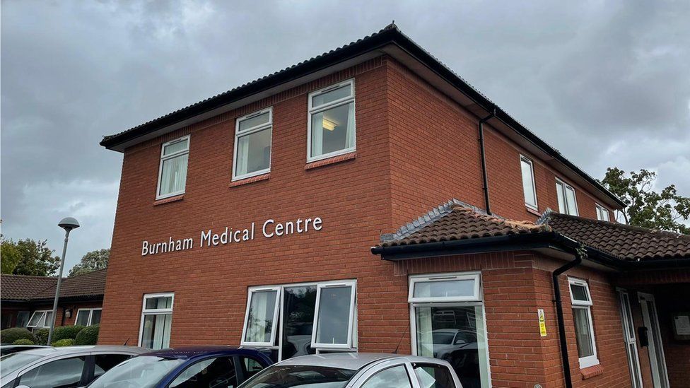 a red brick building saying burnham medical centre