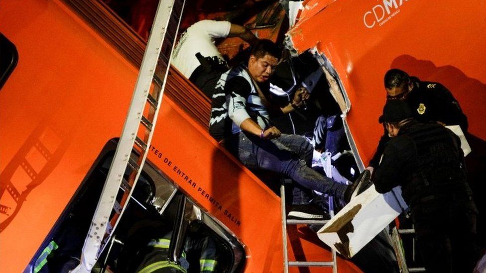 Rescuers search for survivors at a crash site in Mexico City, Mexico. Photo: 4 May 2021