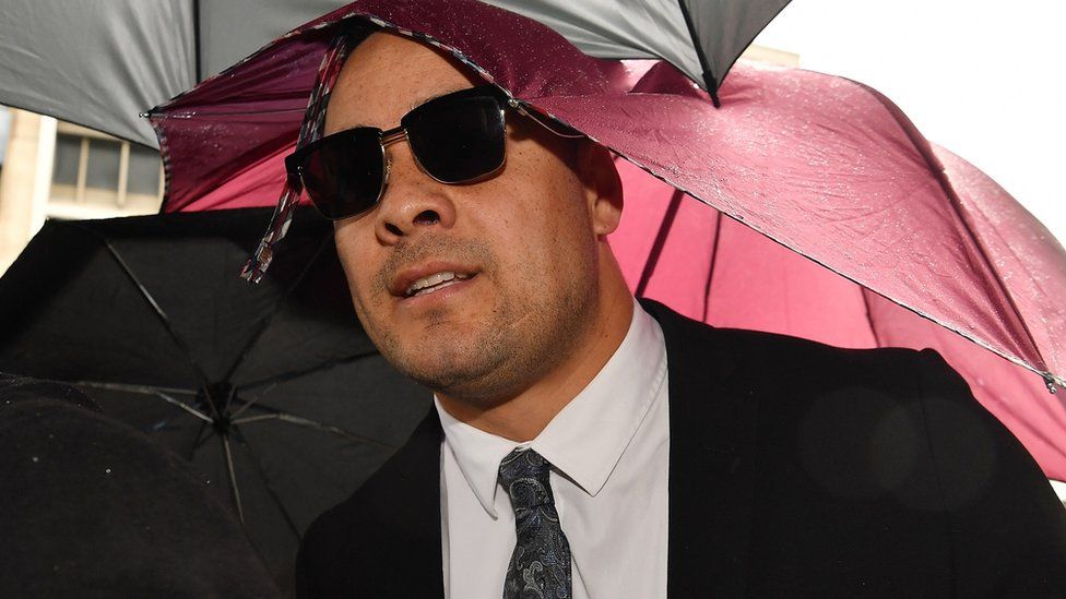 Jarryd Hayne arrives, surrounded by supporters, at Newcastle District Court on May 06, 2021