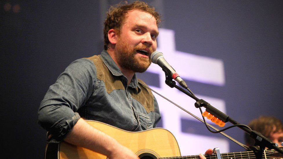 Frightened Rabbit: Image of Scott Hutchison on display at portrait ...