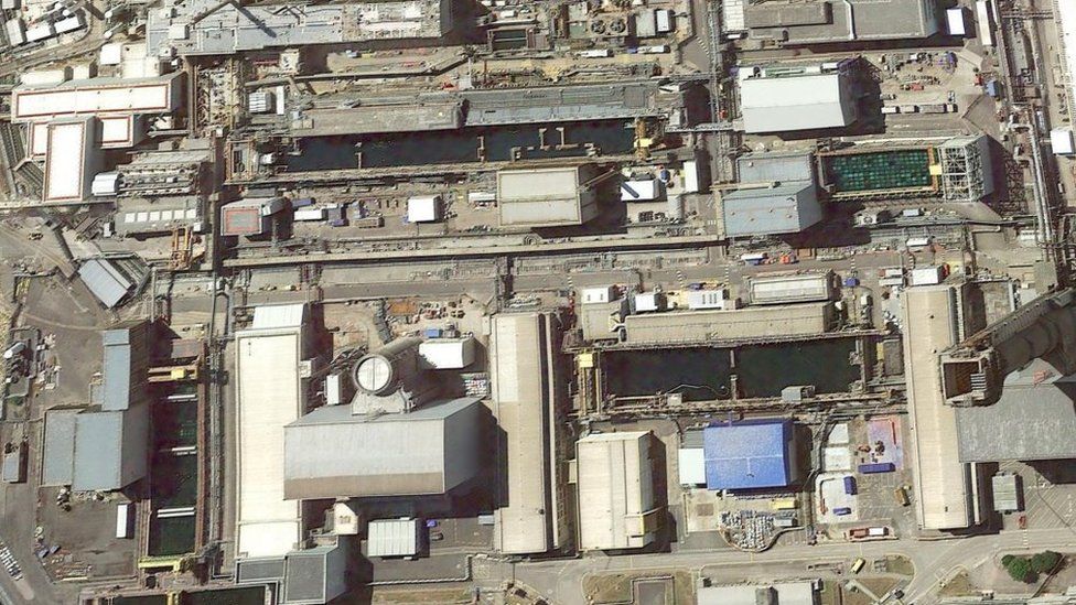 Aerial view of large pools among buildings on Sellafield site