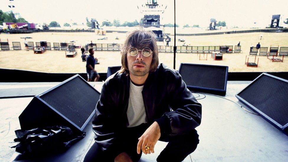 Liam Gallagher on stage at Knebworth House in 1996