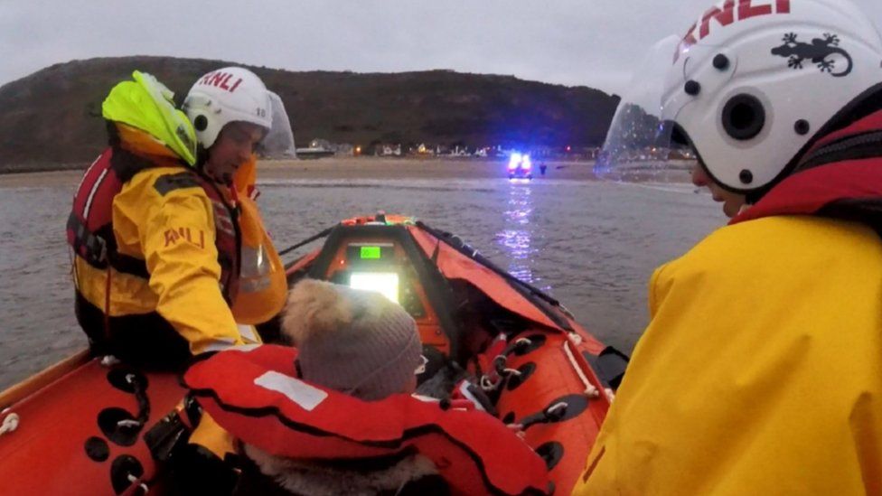 Lifeboat crews rescued a woman marooned while walking her dog on the sandbanks off Llandudno’s west shore on New Year's Day 2019