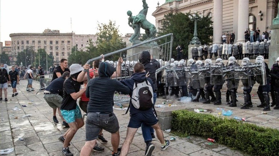 Protesters clash with riot police in front of the parliament building in Belgrade, Serbia. Photo: 9 July 2020