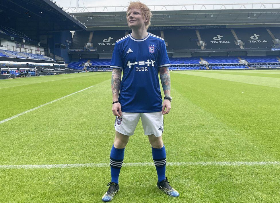 Ed Sheeran in the Ipswich Town kit