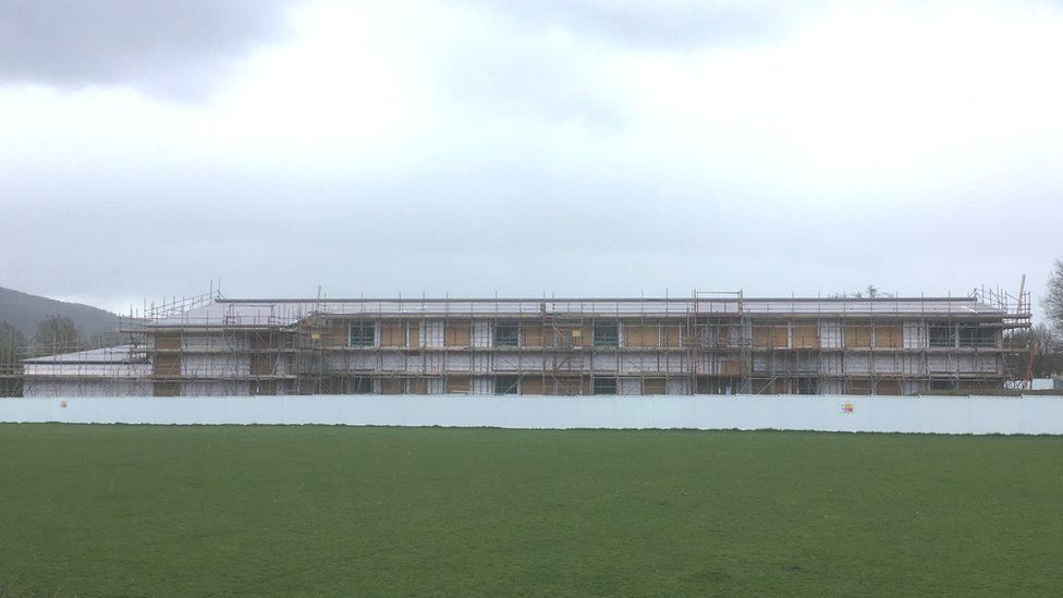 The primary school in Welshpool - the structure has been built and is surrounded by scaffolding