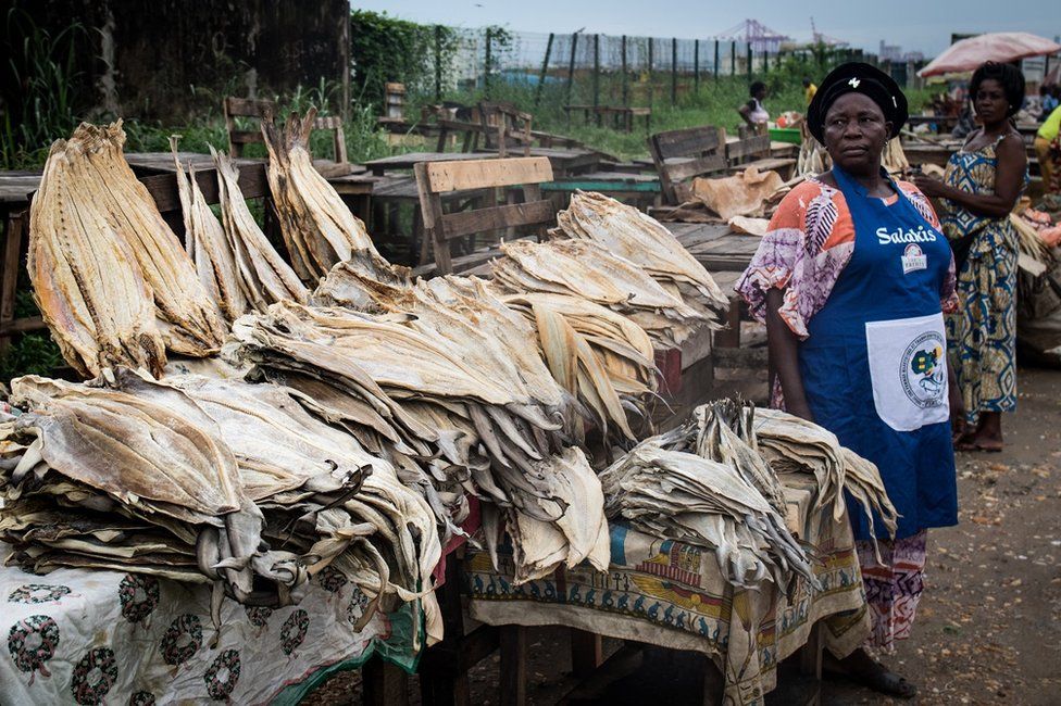 Market woman selling fish