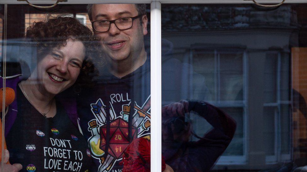 Couple at a window