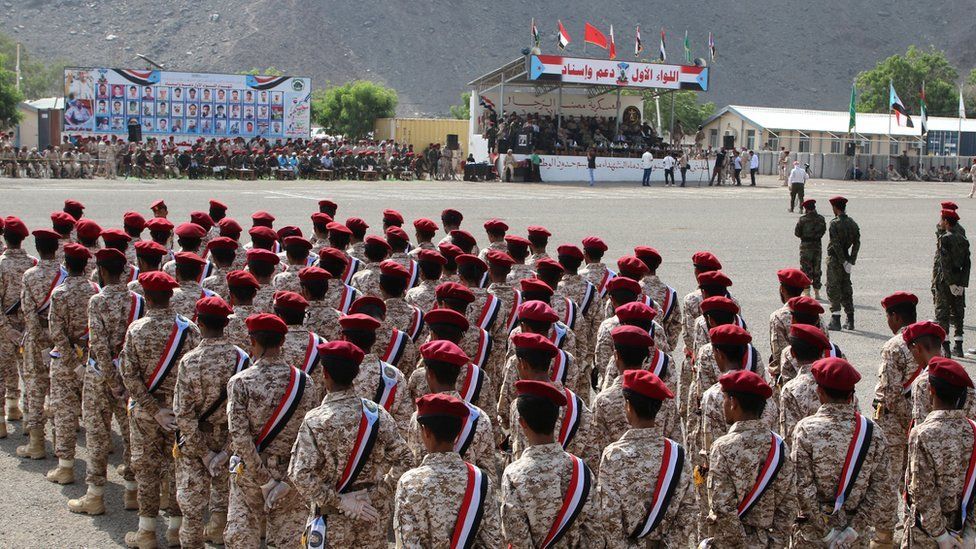Newly-recruited troopers take part in a graduation parade in Aden shortly before the attack