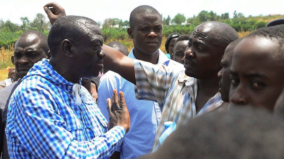 Ugandan opposition leader Kizza Besigye speaks to supporters during presidential elections