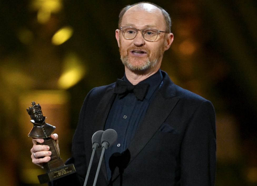Mark Gatiss with the Best Actor award on stage during The Olivier Awards 2024 at The Royal Albert Hall on April 14, 2024 in London, England
