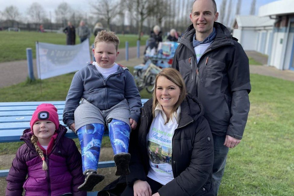 Huthwaite Charity walk for boy who lost legs after sepsis BBC News