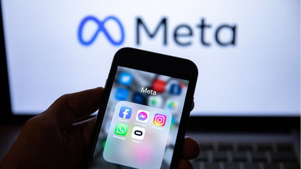 In this photo illustration, the app icons of Facebook, Messenger, Instagram, WhatsApp, and Oculus VR are displayed on a smartphone screen with a Meta logo in the background.