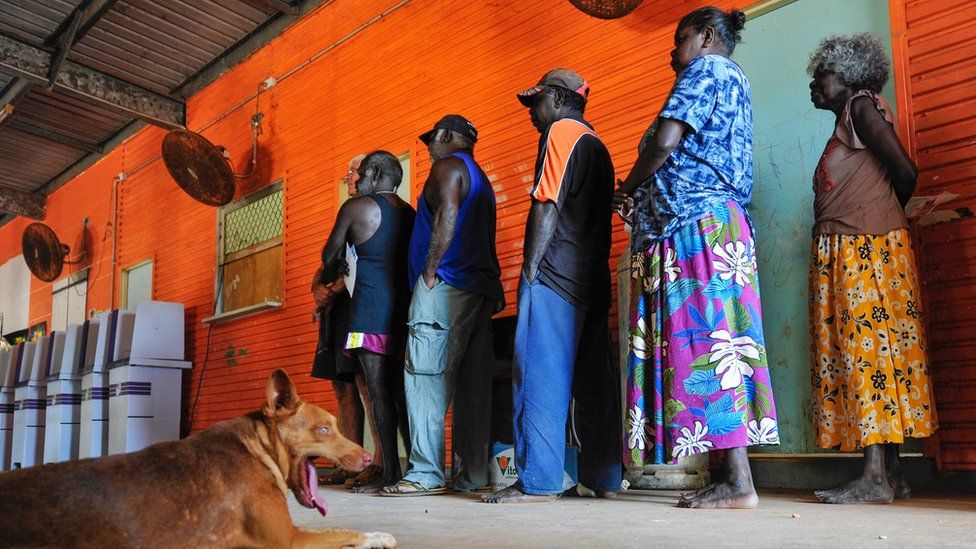 A queue of Aboriginal people waiting to vote in Warruwi, Northern Territory, in 2013