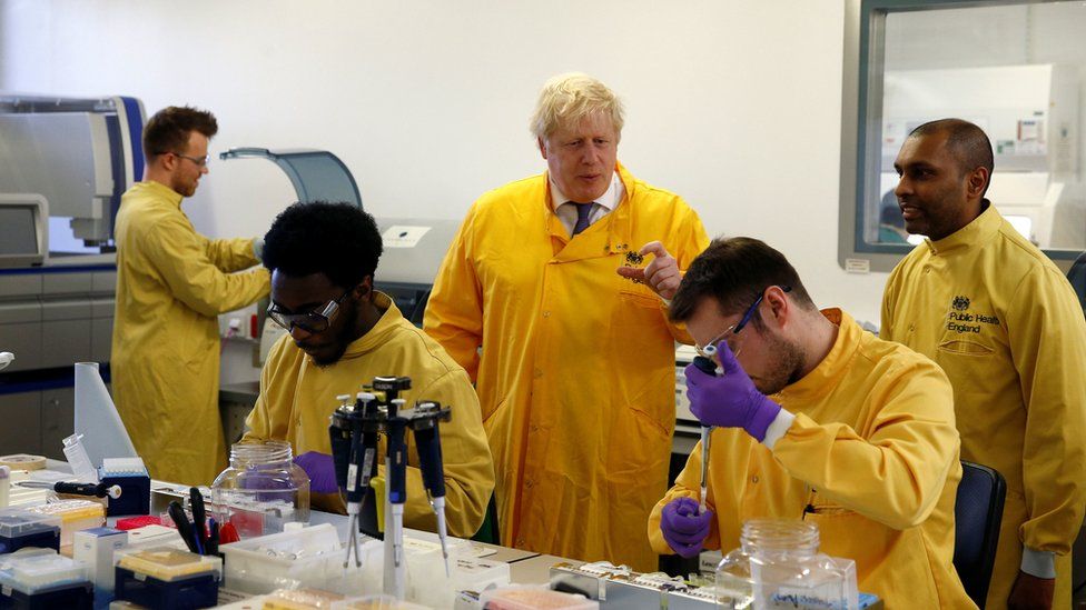 Prime Minister Boris Johnson visits a laboratory at the Public Health England National Infection Service in Colindale, north London, as the number of confirmed coronavirus cases in the UK rose