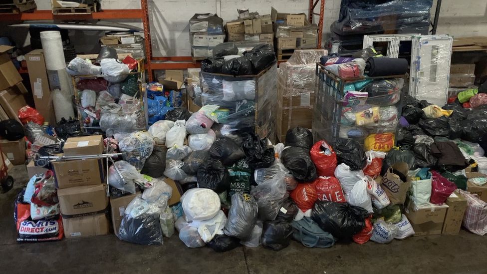 Piles of donations at the Island Express warehouse