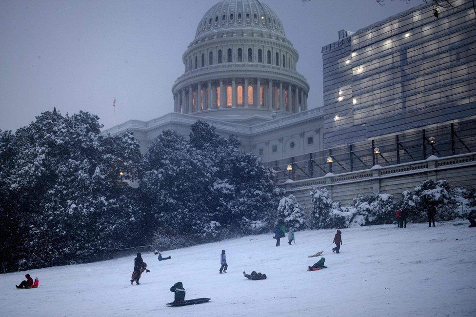 People sledging on Capitol Hill in Washington