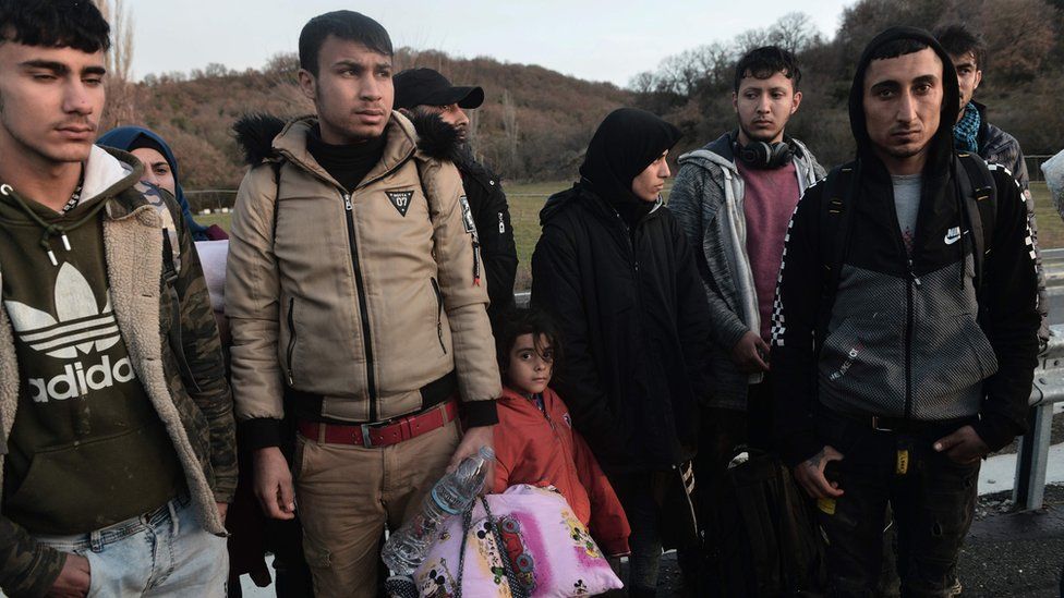 Migrants in Greek custody at the border with Turkey near Kastanies, 3 March