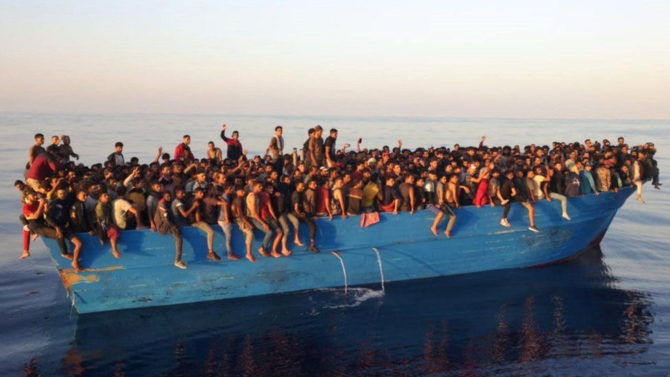 Hundreds of migrants on a boat off the island of Lampedusa, Italy, 28 August 2021