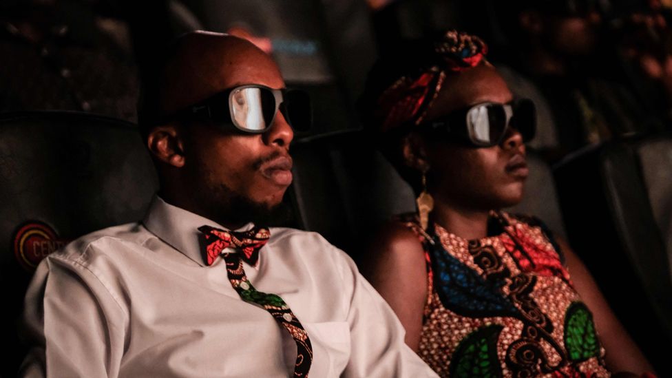 Invited guests watch the film "Black Panther" in 3D in Nairobi, Kenya, on February 14, 2018