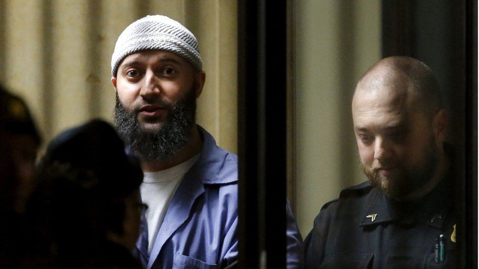 Image shows Adnan Syed leaving court in 2016
