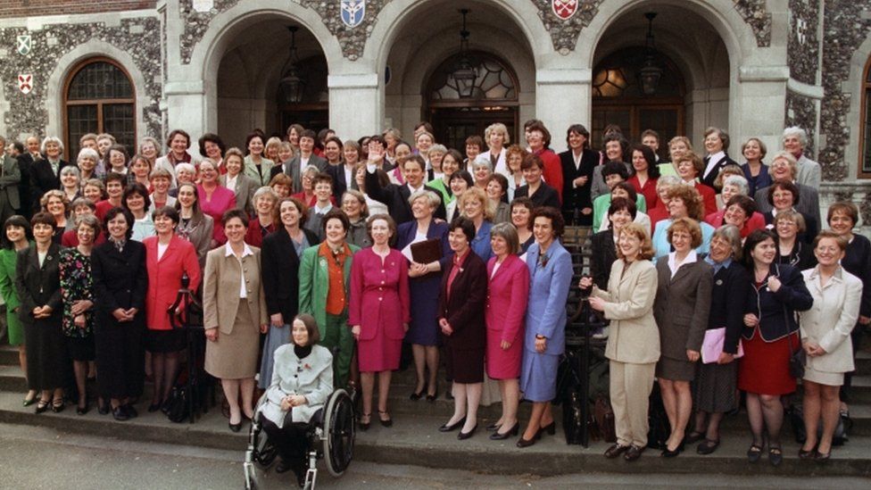 Tony Blair surrounded by his 101 women MPs in Westminster 1997