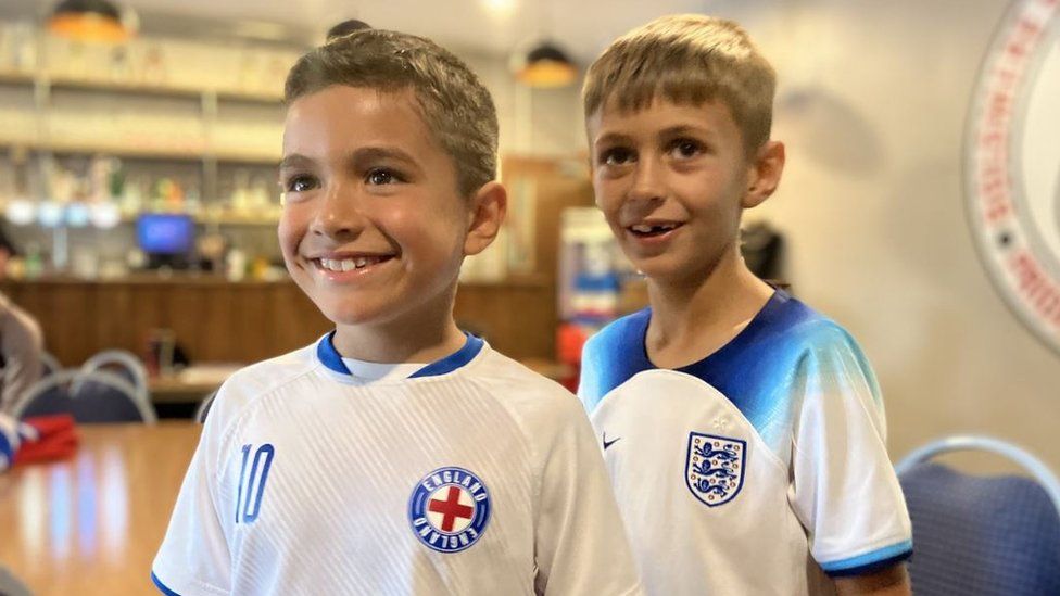 Two boy football fans