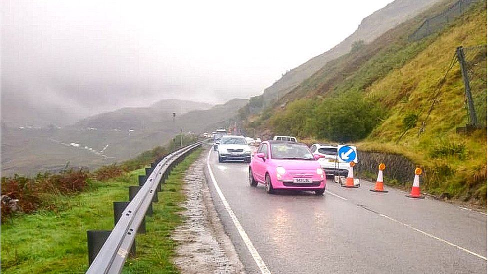 Cars make their way through traffic lights as the A83 reopened on Monda morning