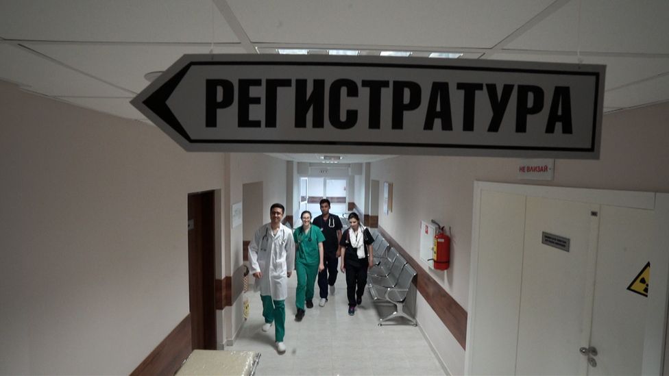 Doctors walking down a hospital corridor in Bulgaria