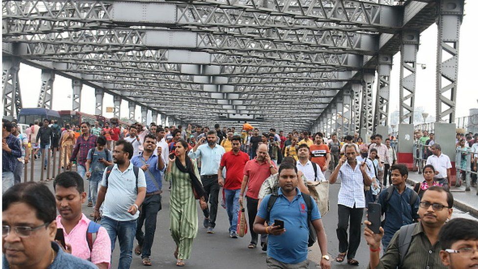 Communicators cross Howrah Bridge during Police seal Howrah bridge ,Not allowing public transport due to the Bharatiya Janata Party March Nabanna (State secretariat office) in Kolkata ,India on September 13,2022.