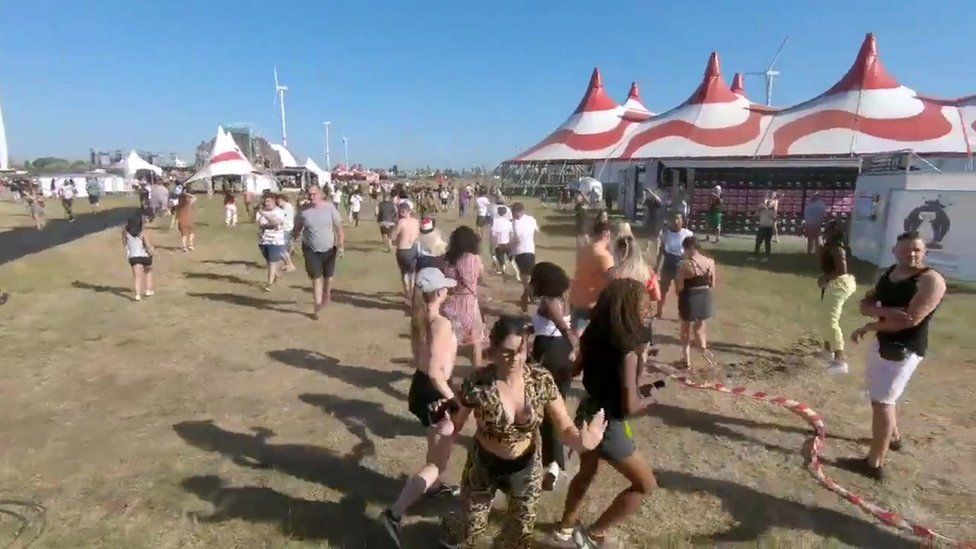 Festival-goers scrambled as the event gets shut down