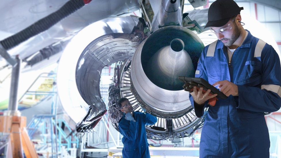 Stock image of an aircraft engineer