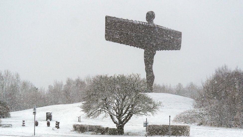 The Angel of the North covered in snow