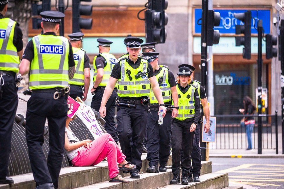 Police at climate change protest in Glasgow