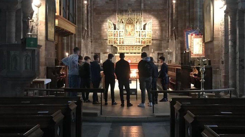 Group of boys at the front of the church