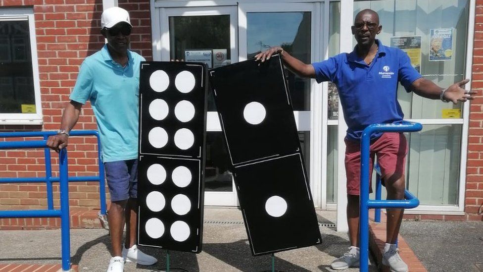 Lawrence Walker and Max Thomas with giant dominoes