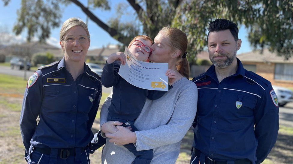Monty and Wendy Cocker with paramedics Danielle Masters and Mark Smalls