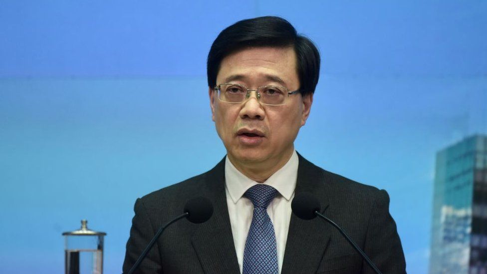 John Lee Ka-chiu, chief secretary for administration of Hong Kong government, speaks during a press conference on the determination results of the Candidate Eligibility Review Committee for the 2021 Election Committee Subsector Ordinary Elections on August 26, 2021 in Hong Kong,